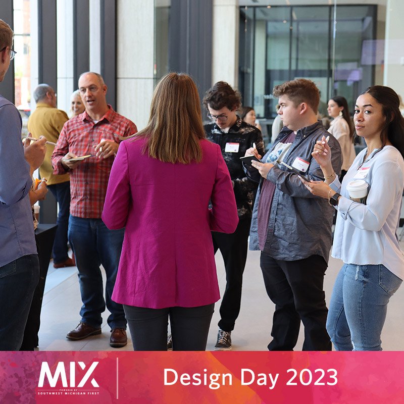 photo of a group of diverse design professionals eating, drinking and talking in The Catalyst Center at MIX Design Day 2022