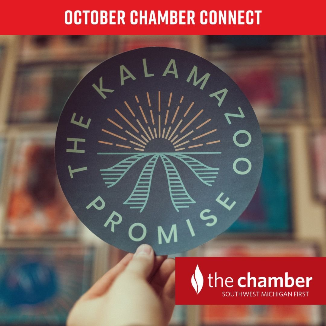 a photo showing a hand holding a sign with The Kalamazoo Promise logo on it