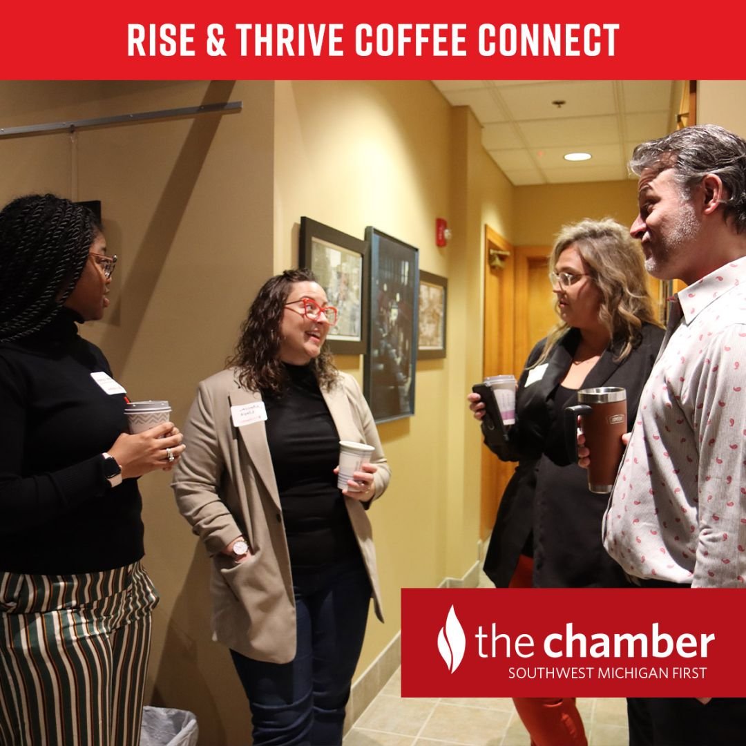 photo of four business professionals standing, smiling, talking and drinking coffee at the Rise & Thrive Coffee Connect event at Farmers Alley Theatre