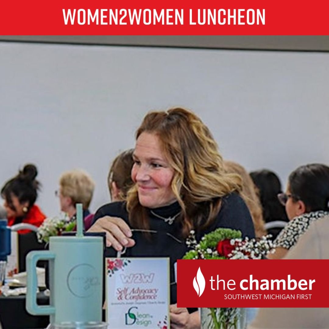 smiling woman at a women's luncheon
